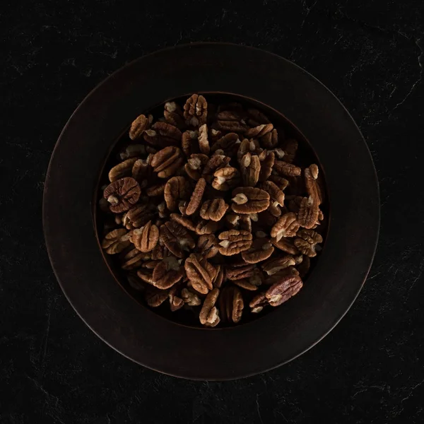 Pecan nuts in bowl — Stock Photo