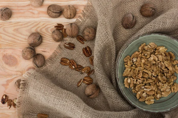 Shelled walnuts in bowl — Stock Photo