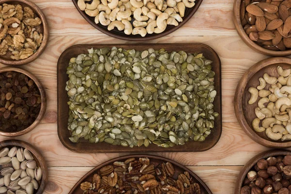 Pumpkin seeds and nuts — Stock Photo