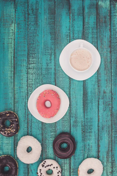 Doughnuts and coffee — Stock Photo