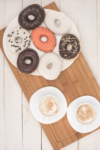 Doughnuts and coffee — Stock Photo