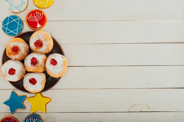 Donuts and cookies with star of david — Stock Photo