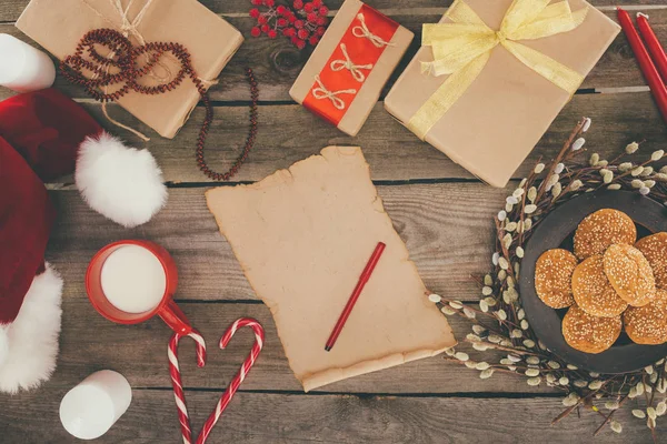 Papyrus and christmas presents — Stock Photo