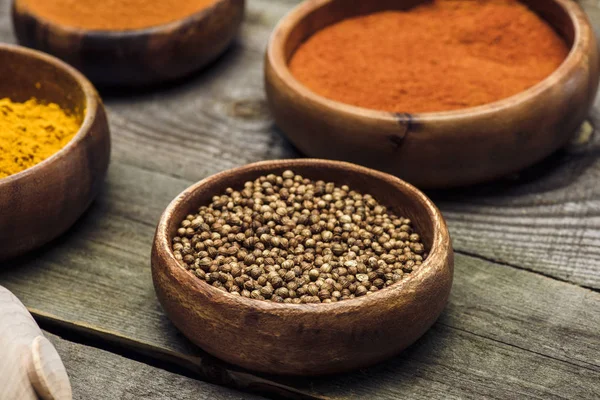 Bowls with coriander and turmeric — Stock Photo