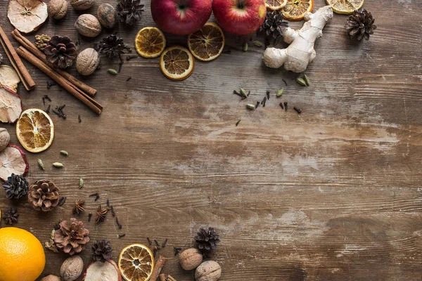 Fresh and dried fruits with spices — Stock Photo