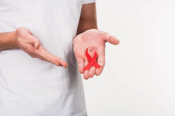 Man presenting aids ribbon — Stock Photo