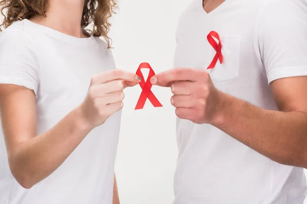 Couple with aids ribbons — Stock Photo
