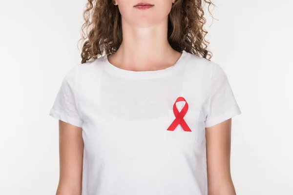 Woman with red aids ribbon — Stock Photo