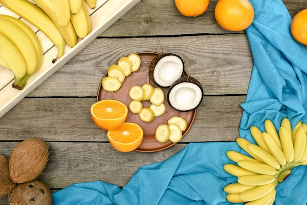 Tropical fruits on table — Stock Photo