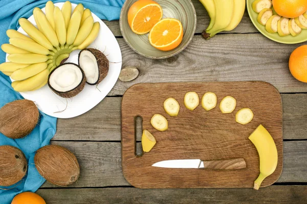 Tropical fruits on table — Stock Photo