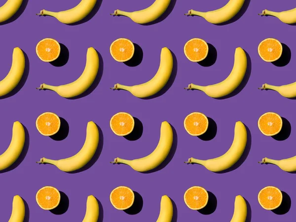 Padrão com bananas e laranjas — Fotografia de Stock