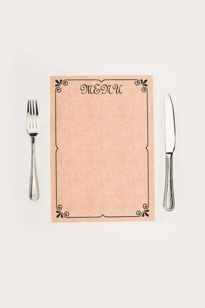 Decorative menu and cutlery — Stock Photo