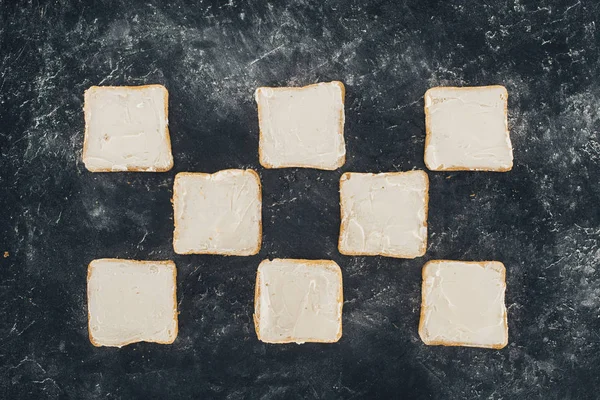 Tasty toasts with butter — Stock Photo