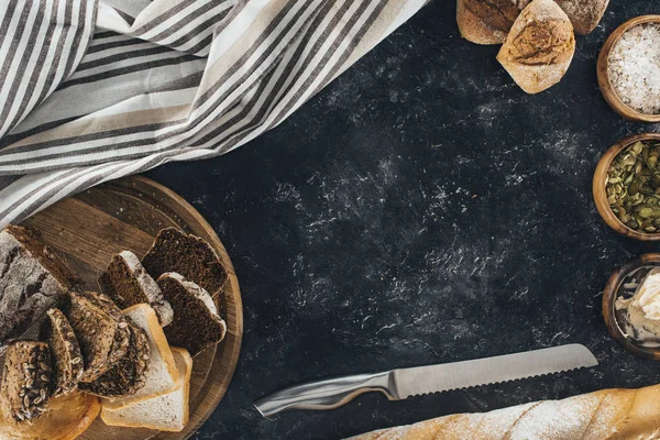 Homemade bread and knife — Stock Photo