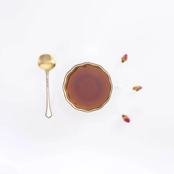 Cup of tea and spoon — Stock Photo