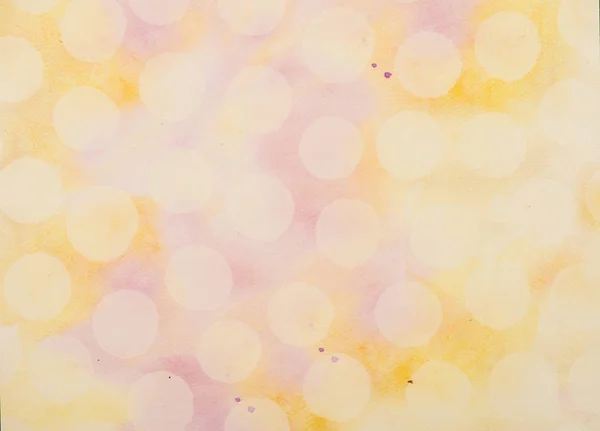 Set of white circles on yellow and purple watercolor surface — Stock Photo