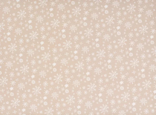 White transparent falling snowflakes on beige — Stock Photo