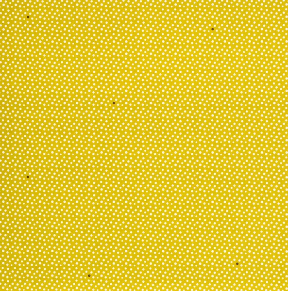Set of different sized white circles on yellow — Stock Photo