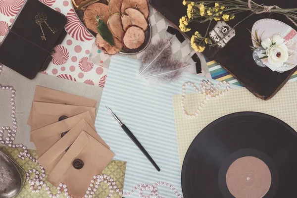 Top view of retro objects over pack paper background — Stock Photo