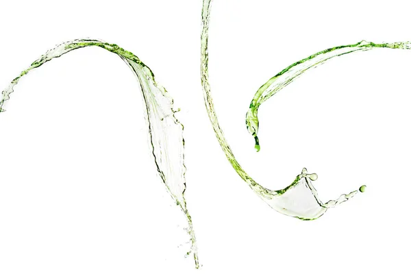 Spruzzi d'acqua verdi isolati su bianco — Foto stock
