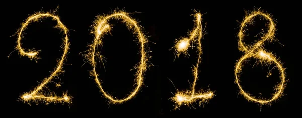 Close up view of sparkling 2018 year sign isolated on black — Stock Photo
