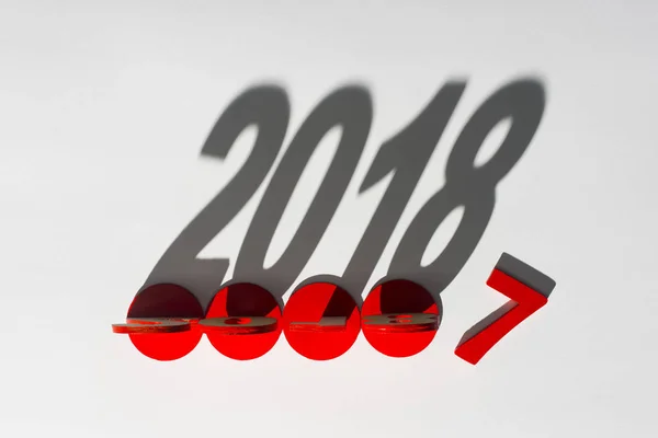 Top view of 2018 year sign shadow isolated on grey — Stock Photo