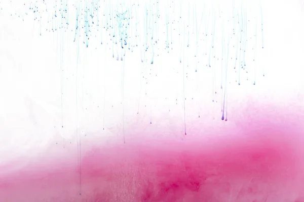 Close up view of pink ink splash isolated on white — Stock Photo