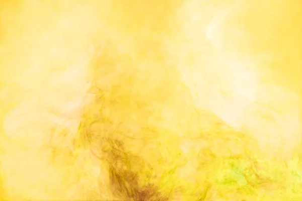 Close up view of yellow paint splashes — Stock Photo