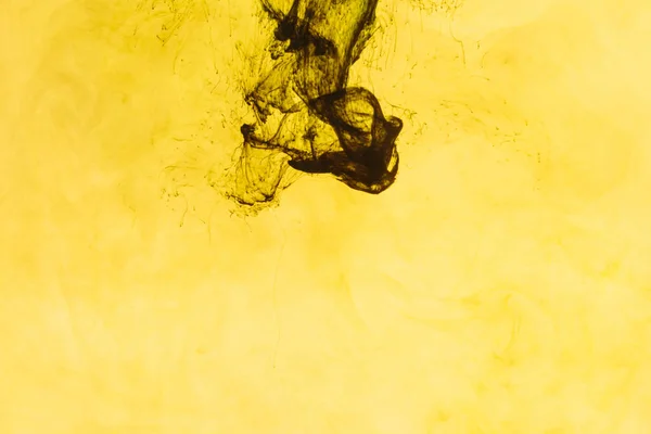 Close up view of yellow paint splashes — Stock Photo