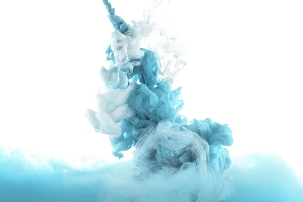 Mixing of blue paint splashes isolated on white — Stock Photo