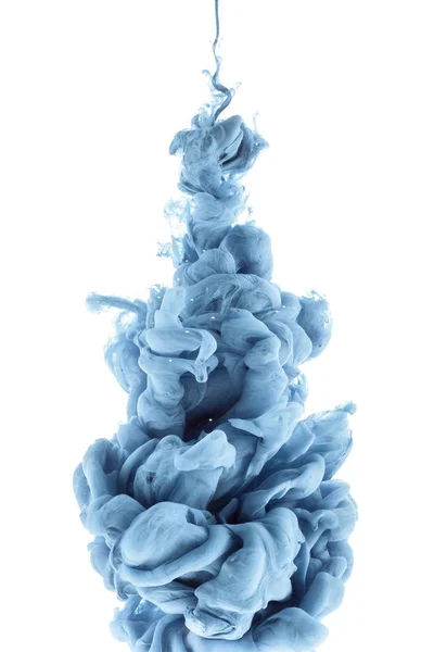 Close up view of blue paint splash in water, isolated on white — Stock Photo