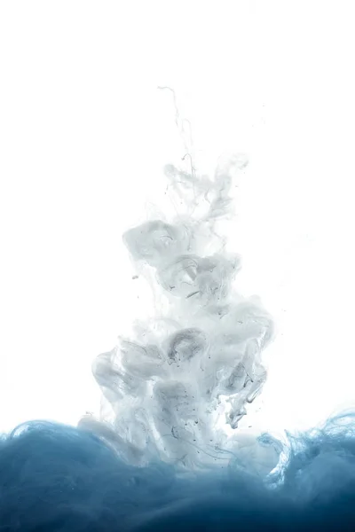 Close up view of mixing of blue and white paint splashes isolated on white — Stock Photo