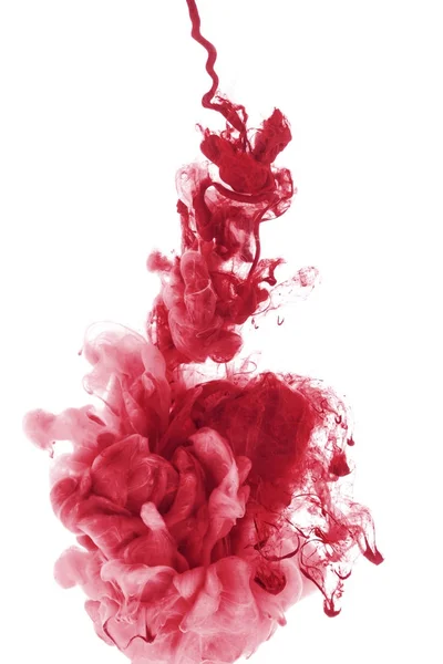 Red paint splash in water, isolated on white — Stock Photo