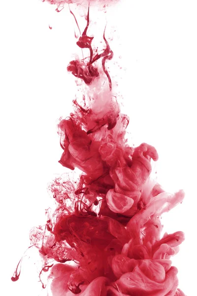 Salpicadura de pintura roja en agua, aislada en blanco — Stock Photo