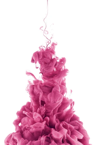 Respingo de tinta rosa na água, isolado em branco — Fotografia de Stock