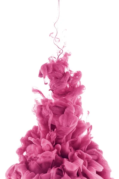 Pink paint splash in water, isolated on white — Stock Photo