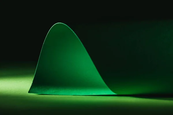 Green warping paper for decoration on black — Stock Photo