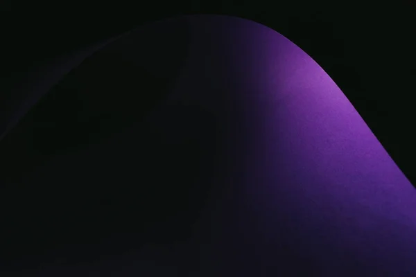 Dark purple paper for decoration on black — Stock Photo