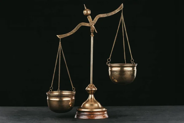 Vintage themis scales isolated on black — Stock Photo