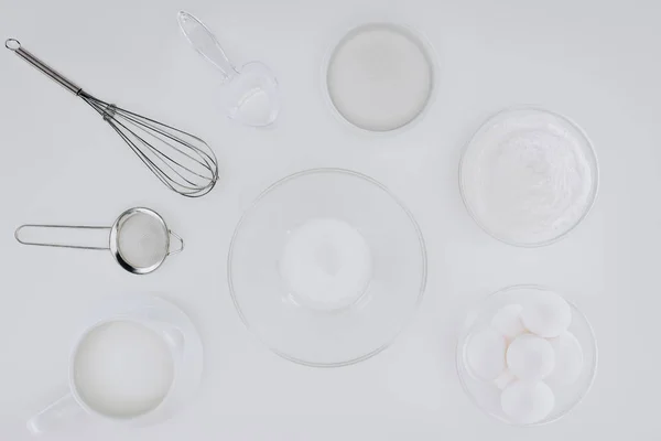 Top view of utensils and ingredients for cooking pancakes isolated on grey — Stock Photo