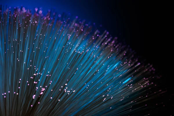 Close up of blue fiber optics texture background, communication technology — Stock Photo