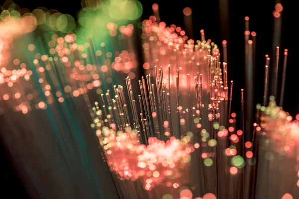 Close up de fundo de textura de fibra óptica rosa brilhante — Fotografia de Stock