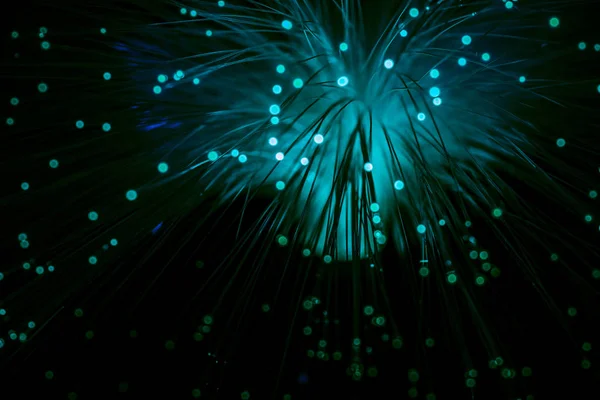 Shiny blue fiber optics background — Stock Photo