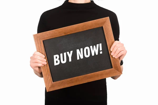 Partial view of woman holding board with lettering buy now isolated on white — Stock Photo