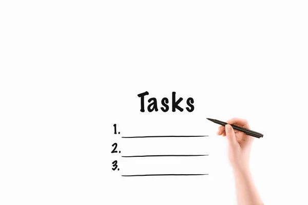 Cropped image of woman writing tasks inscription isolated on white — Stock Photo