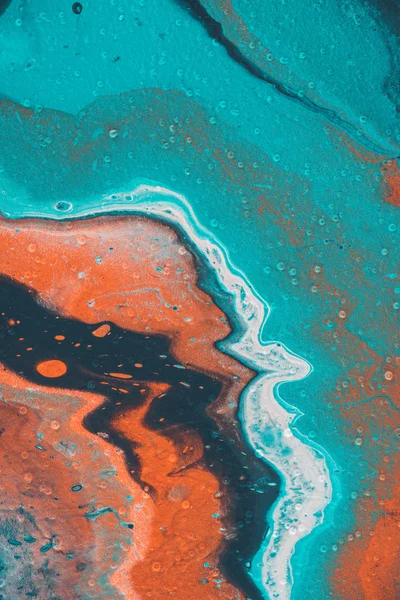 Abstract design with blue and orange oil paint — Stock Photo