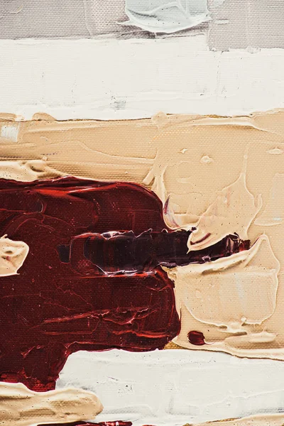 Close up de traços de pincel bege e borgonha na pintura a óleo — Fotografia de Stock