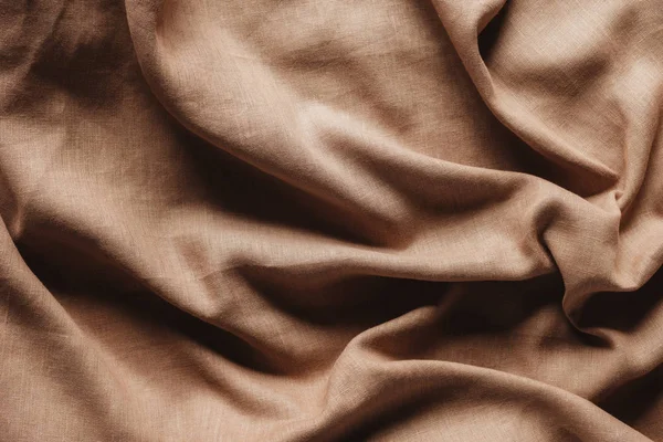 Top view of beige linen tablecloth texture — Stock Photo