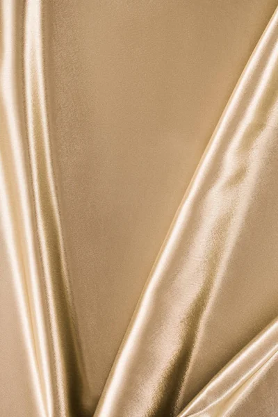 Fondo de tela de satén elegante dorado - foto de stock