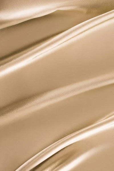 Fond en tissu satiné brillant beige — Photo de stock